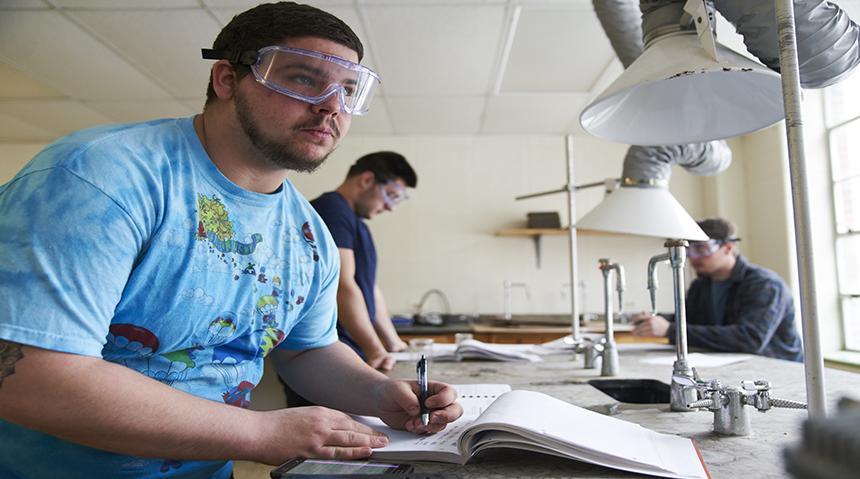 Student in a science lab doing research