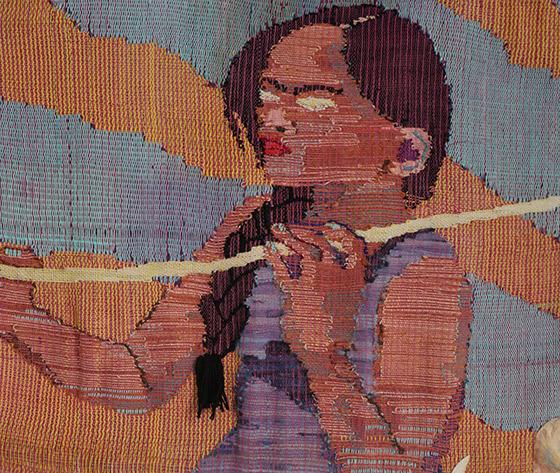 cloth weaving of woman holding a stick