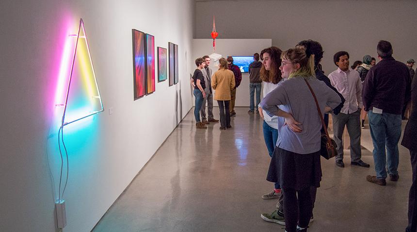 people viewing an exhibit